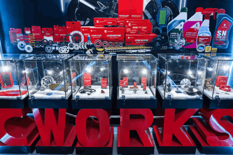 CWORKS products in red CWORKS packaging on display
